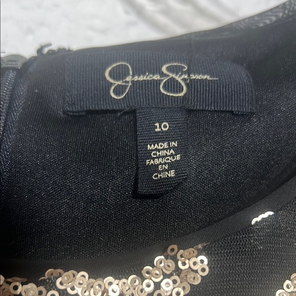 Jessica Simpson - Elegant Black and Gold sequence Dress size 10

Worn once - Picture 5 of 7